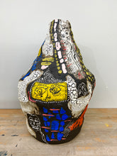 "Man in Space" by Kassandra Carey, Ceramic