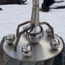 "Resilience" by Tom Watson, Stainless Steel, Glass