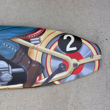 "Tin Toy Motorcycle" by Dwight Touchberry, Mixed Media on Recycled Surfboard