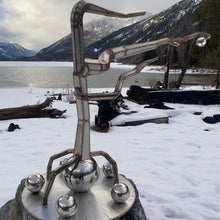 "Resilience" by Tom Watson, Stainless Steel, Glass